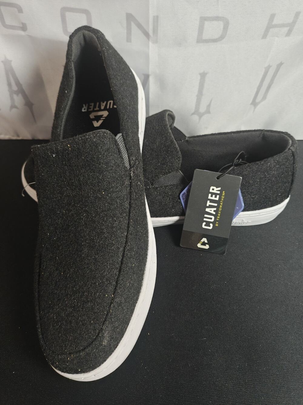 NWT Cuater Men's 9 Phenom Slip On Black / Gray 4MU190- Travis Mathew Blemishes